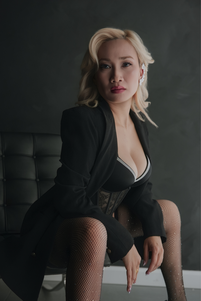 Boudoir for moms showcasing a woman’s confidence beyond motherhood with a powerful editorial portrait that celebrates strength, femininity, and personal identity.
